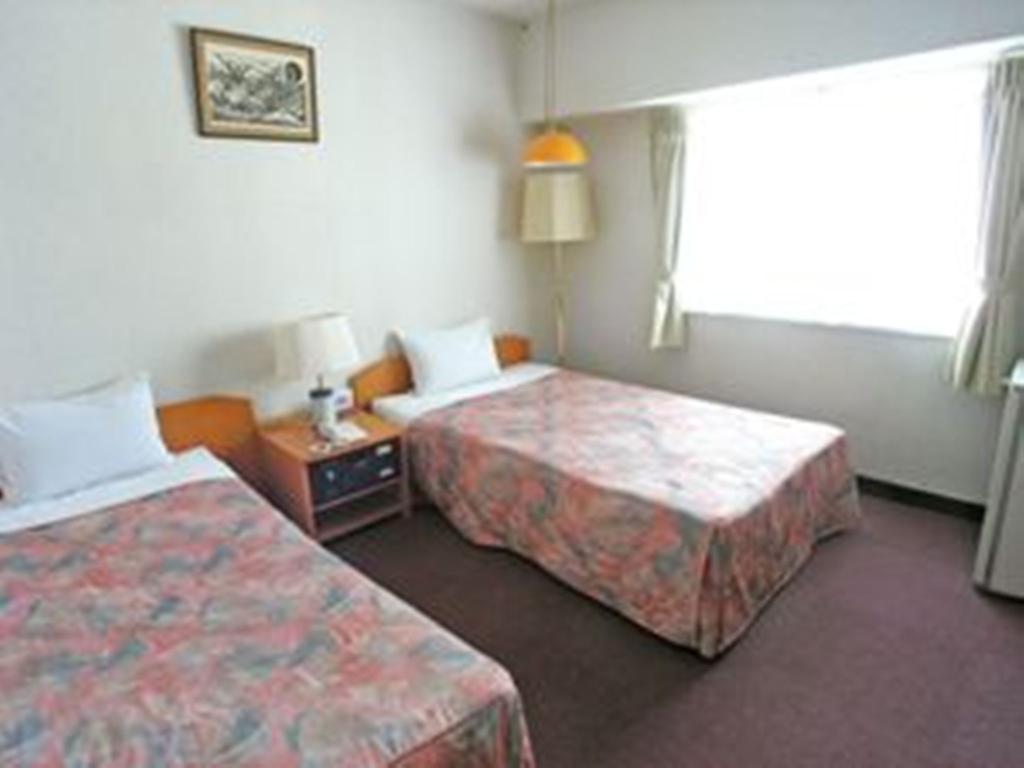 Okinawa Hotel Continental Naha Habitación foto